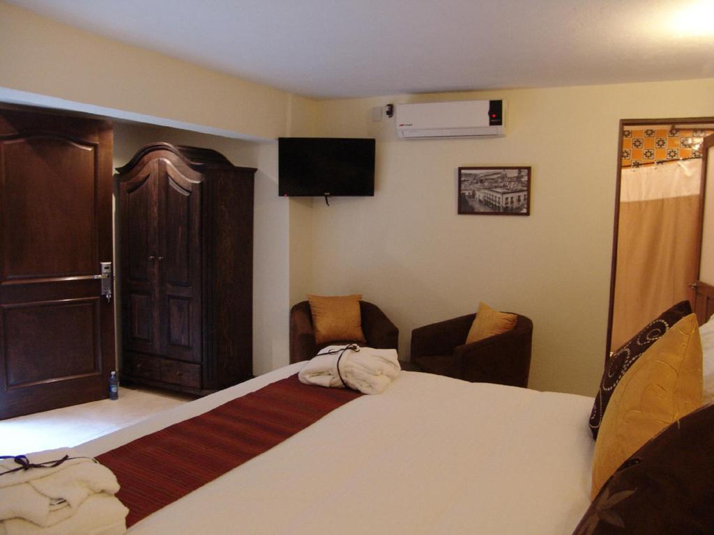 סאן מיגל דה אלנדה Casa Del Tio Hotel Boutique חדר תמונה A room at the hotel
