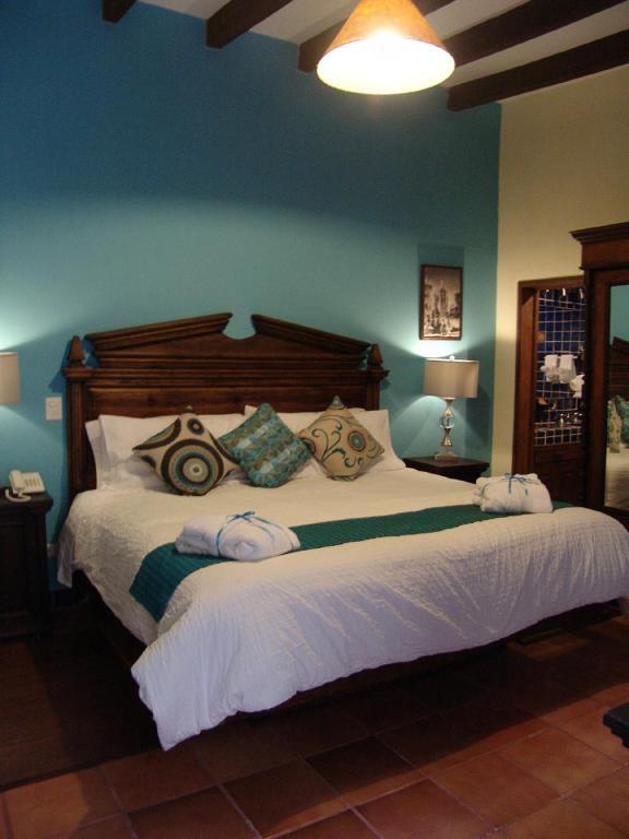 סאן מיגל דה אלנדה Casa Del Tio Hotel Boutique חדר תמונה A bedroom at Hotel San Angel Inn